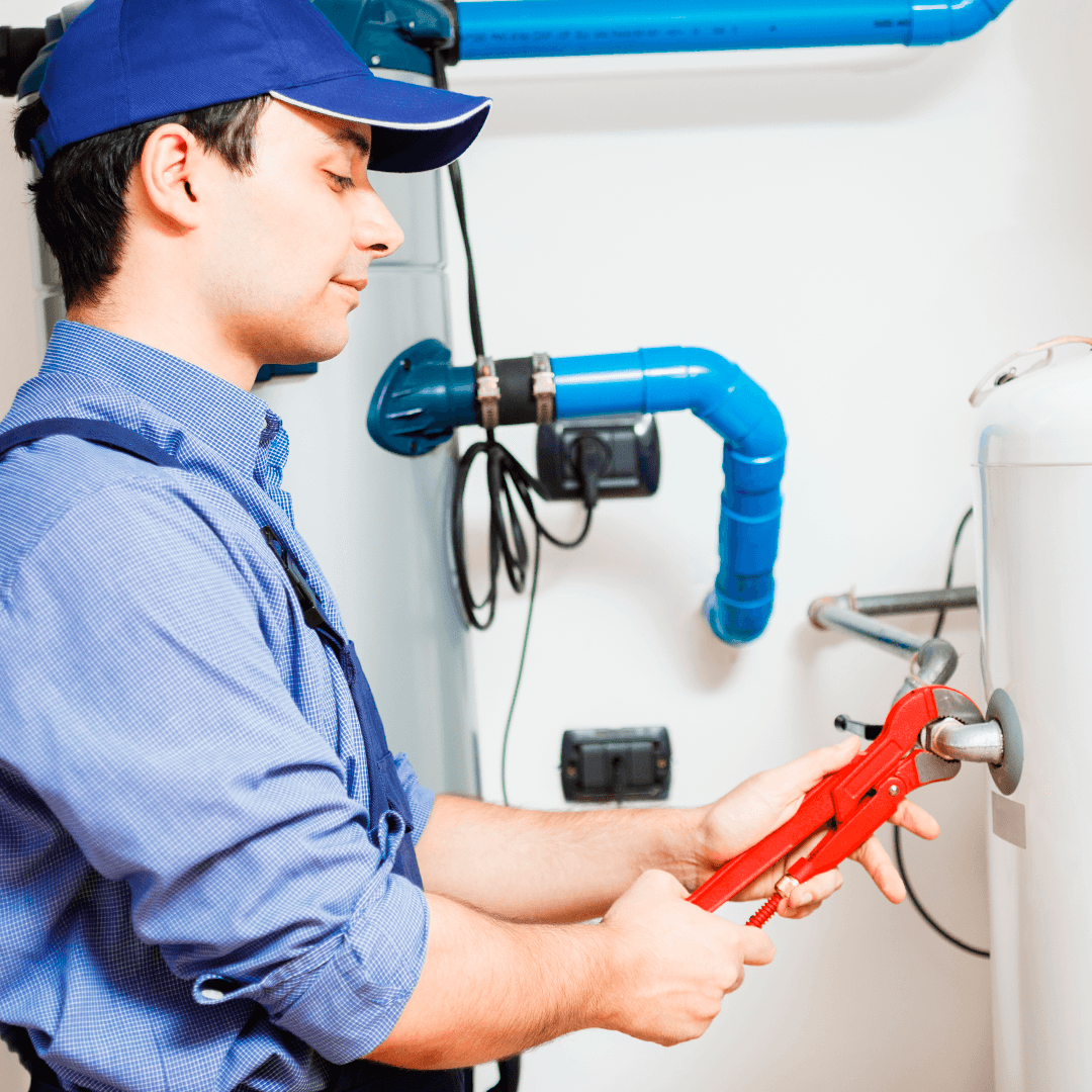 Heating engineer fixing Boiler